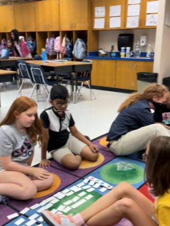 Ms. Ney's students playing math games