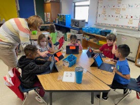 students using ipads to learn